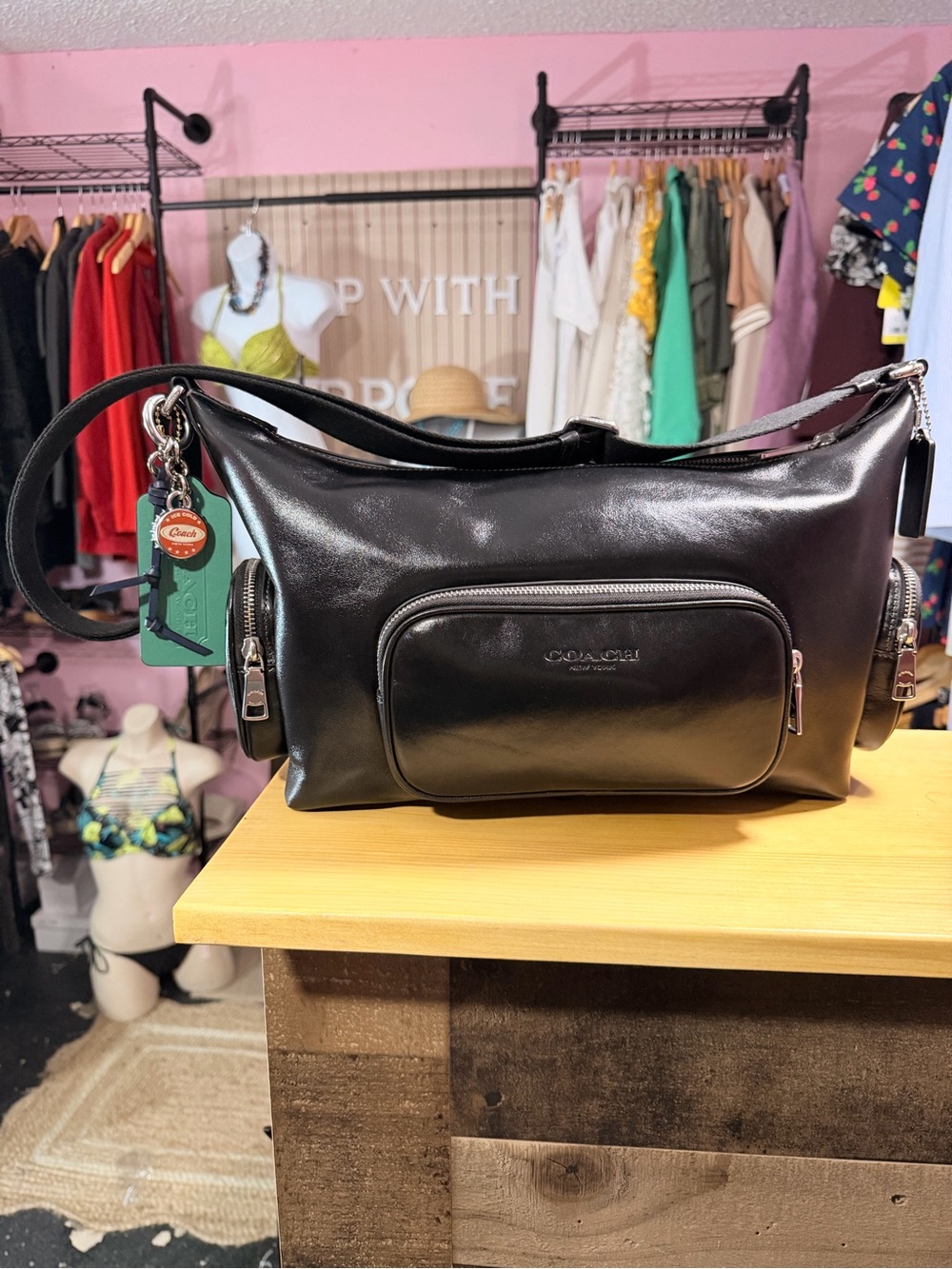 Coach Black Leather Shoulder Bag with Front Pouch and Zip Details
